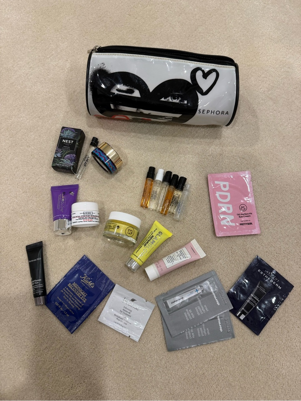 Sephora White Black Heart Print Cosmetic Pouch with Assorted Sample Skincare